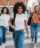 Group of diverse young adults walking to class