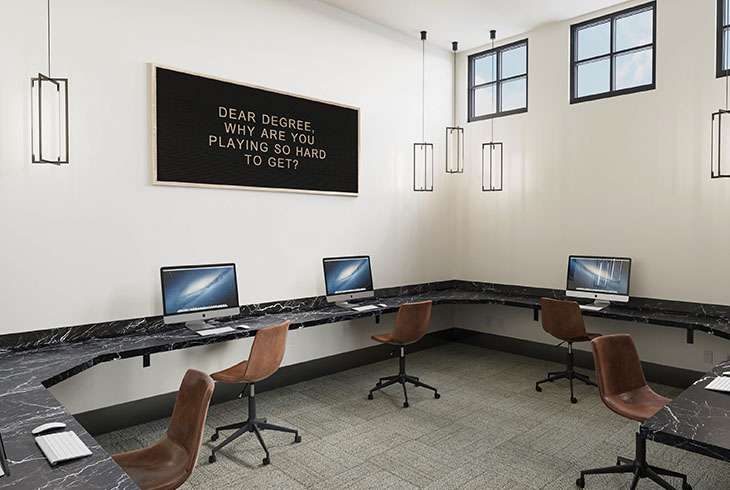 Internet cafe featuring multiple work stations